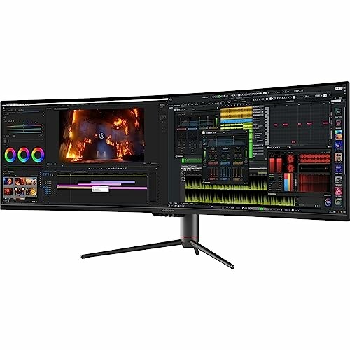 Dual monitors displaying video and audio editing software.